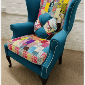 Hilton Hotel Wingback Chair re-upholstered in bright patchwork